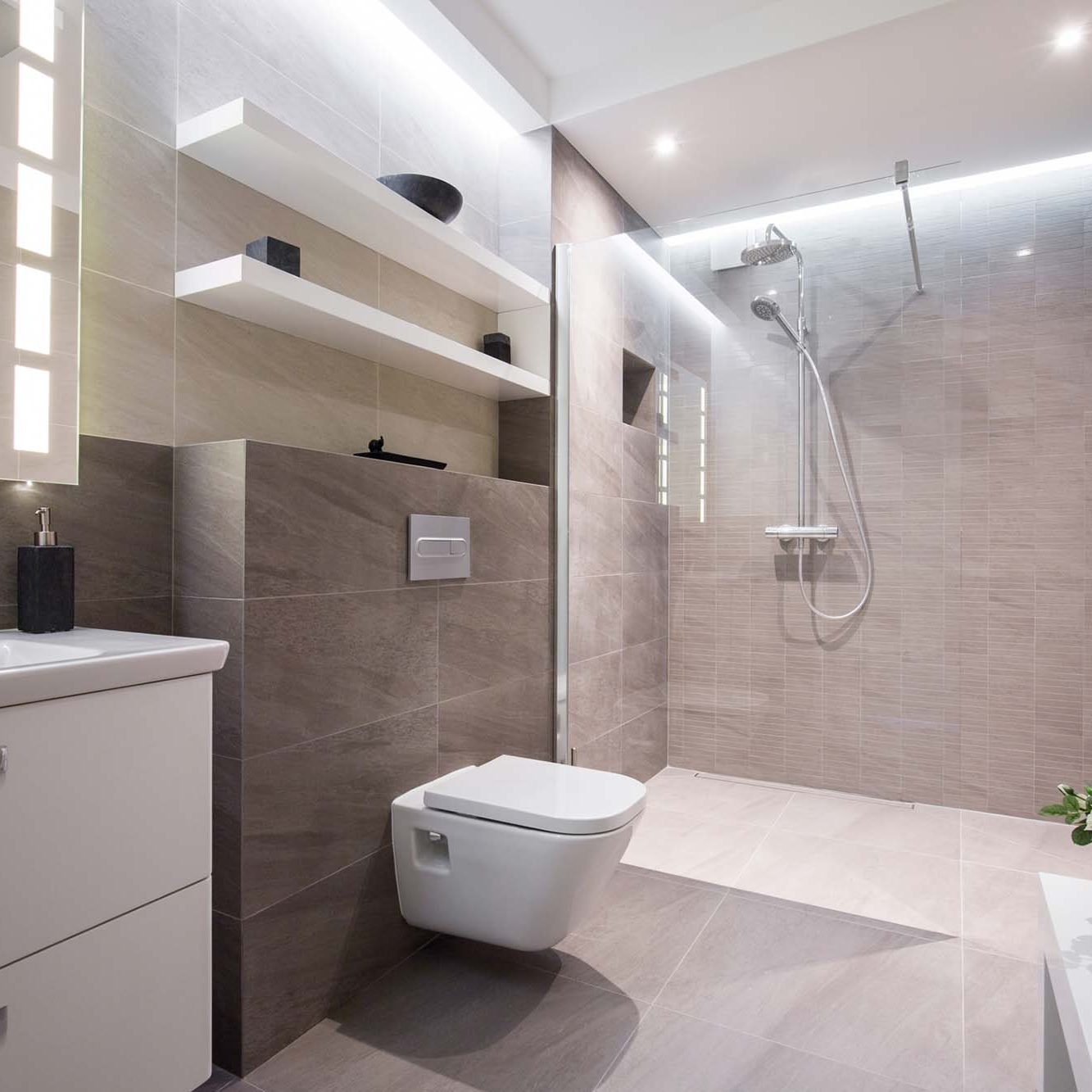 BathroomHero Exclusive modern white bathroom with glass shower