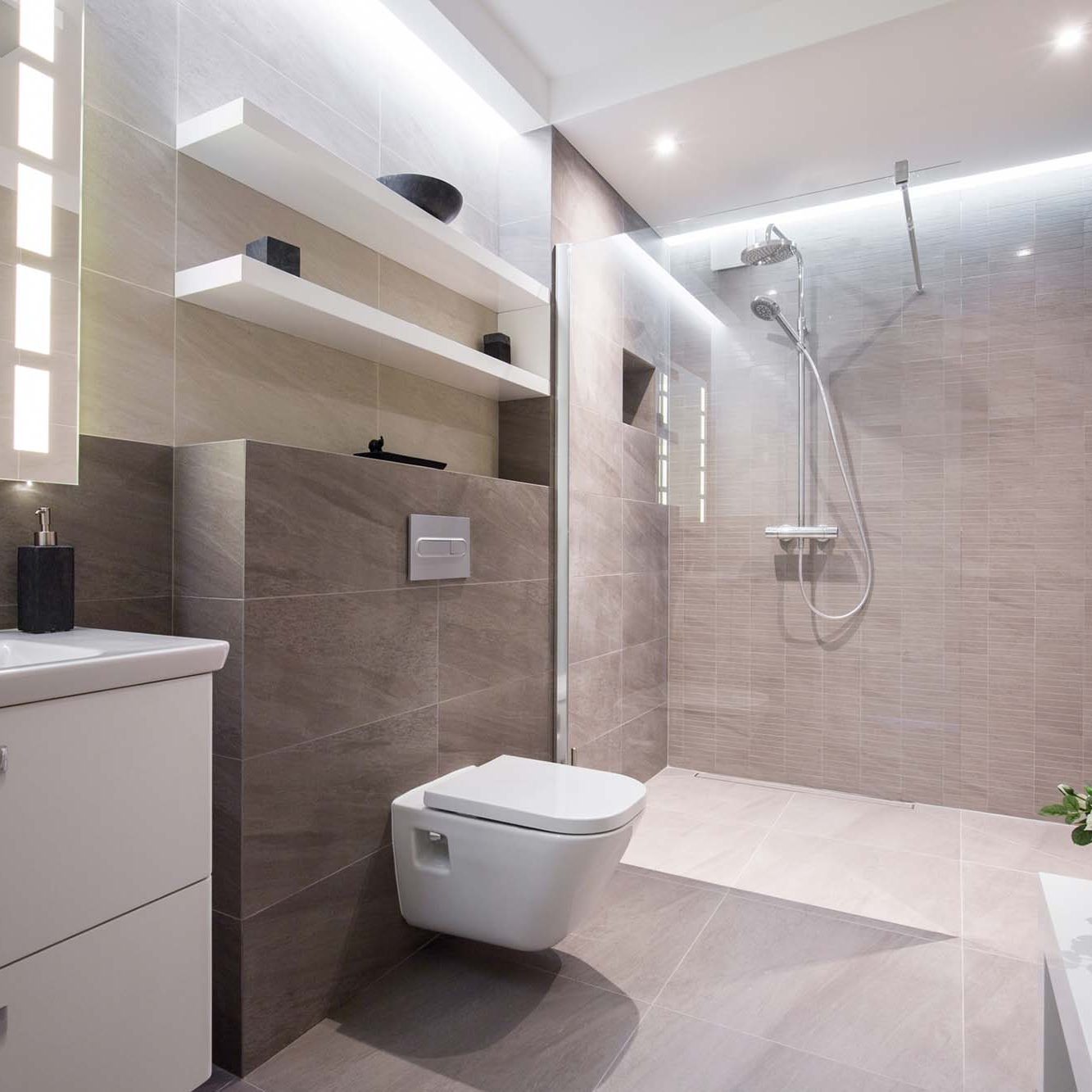 Exclusive modern white bathroom with glass shower